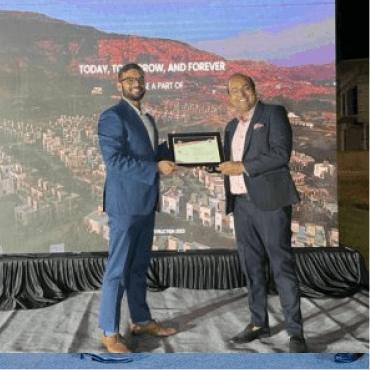 Award presentation with two men