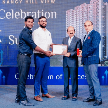 Celebration award ceremony with four people